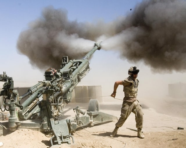 Gunner Jody Winsor, from Robert's Arm, Nfld., with the Canadian 2nd RCHA (Royal Canadian Horse Artillery) fires a 155mm howitzer in support of frontline troops during a mission at the forward operating base in Helmand Province, Afghanistan Wednesday, April 18, 2007. (AP Photo/ CP, Ryan Remiorz)
