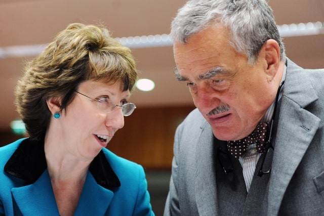 Czech Foreign Minister Karel Schwarzenberg, right, talks with European Foreign Policy Chief Catherine Ashton as they arrive for an EU foreign ministers meeting at the EU Council in Brussels, Monday Nov. 22, 2010. (AP Photo/Geert Vanden Wijngaert)