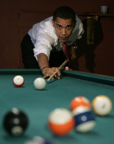 Democratic presidential hopeful, Sen. Barack Obama, D-Ill., plays pool at Schultzie's bar in South Charleston. W.Va., Monday, May 12, 2008, in anticipation of the state's primary election Tuesday. (AP Photo/Jae C. Hong) =@= 
