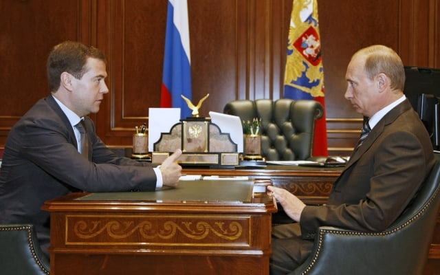 Russian President Dmitry Medvedev, left, and Prime Minister Vladimir Putin seen during their meeting in the Gorki residence outside Moscow, Wednesday, June 4, 2008. Dmitry Medvedev visits Germany on Wednesday, making his first Western trip since succeeding Vladimir Putin as the European Union and Russia prepare to start much-delayed talks on a new 