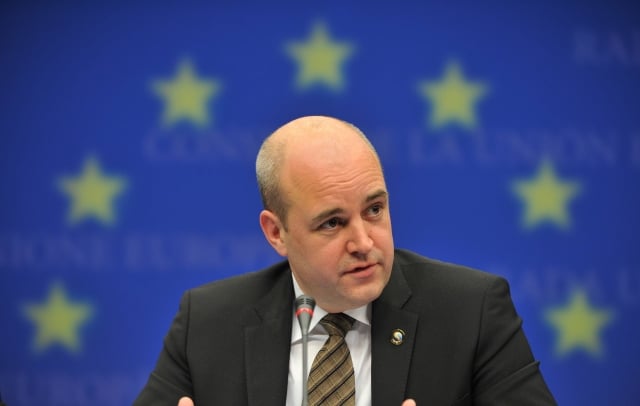 Swedish Prime Minister Fredrik Reinfeldt, whose country holds the EU rotating presidency, attends a press conference after the first day of the European Union (EU) Summit in Brussels, capital of Belgium, on Oct. 29, 2009. Leaders of 27 EU member states have met here on Thursday for a two-day summit to discuss climate change, financing, EU institutional and economic issues. 