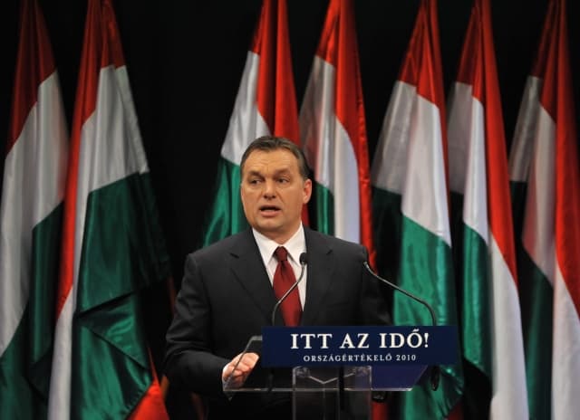 Chairman of the senior opposition conservative party, the Fidesz - Hungarian Civic Alliance, Viktor Orban delivers his annual 'State of Hungary' address in Millenaris Park in Budapest, Hungary, Friday, Febr. 5, 2010. The slogan on the pulpit in front of the speaker reads, Now is the time! State of the nation, 2010. (AP Photo/MTI, Szilard Koszticsak)