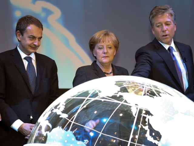 Spain's Prime Minister Jose Luis Rodriguez Zapatero, German chancellor Angela Merkel, and Bill McDermott, chairman of the board of the SAP company, look at an illuminated globe during the opening ceremony of the CeBIT in Hanover, northern Germany, on Monday, March 1, 2010. Some 4,157 exhibitors from 68 nations will present their latest developments on the world's biggest IT fair from Tuesday March 2 to Saturday March 6, 2010. (AP Photo/dapd/Axel Heimken)