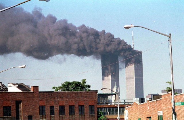 File photo dated 11/09/2001 of the World Trade Centre Towers after a terrorist attack. Millions around the world will tomorrow remember the victims of the 9/11 terrorist attacks, a decade after fanatical extremists used hijacked US airliners to murder nearly 3,000 people.
